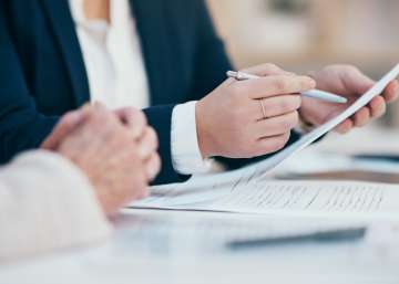 A person looking at documents.