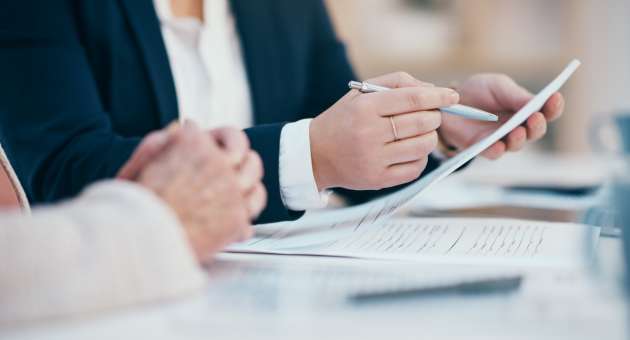 A person looking at documents.