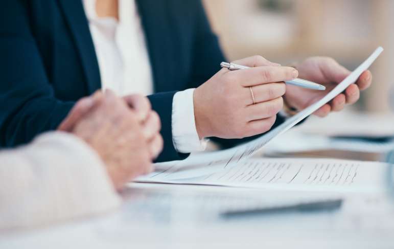 A person looking at documents.